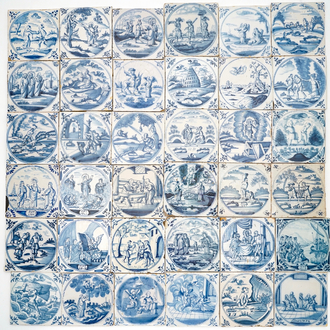 A field of 36 Dutch Delft blue and white tiles with religious scenes in central medallions, 18th C.