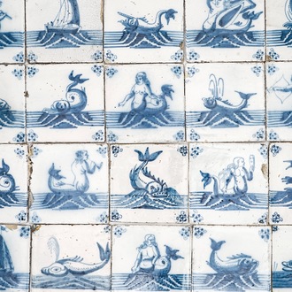Un ensemble de 67 carreaux en faïence de Delft bleu et blanc aux monstres marins et bateaux, 18ème