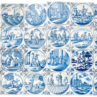 A field of 24 Dutch Delft blue and white tiles with religious scenes in central medallions, 18th C.