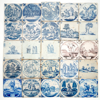 A field of 25 Dutch Delft blue and white and manganese tiles with religious scenes, 18th C.