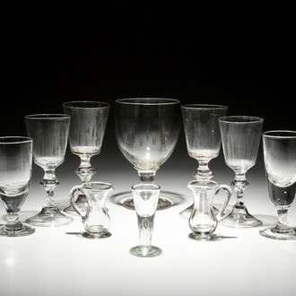 Ten stemmed glasses and two small glass jugs, England, 18/19th C.