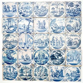 Un ensemble de 25 carreaux en faïence de Delft bleu et blanc aux sujets religieux, 18ème