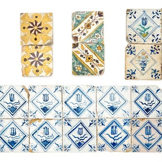 24 polychrome and blue and white Dutch and Spanish Delft tiles with floral designs, 17th C.