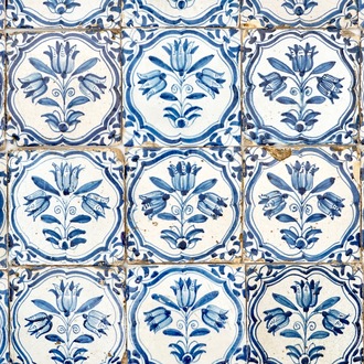 A field of 41 Dutch Delft blue and white tiles with three-tulip design, 17th C.