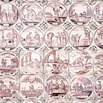 A field of 49 Dutch Delft manganese tiles with religious scenes in central medallions, 18/19th C.