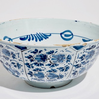 A large Dutch Delft blue and white floral bowl, 18th C.