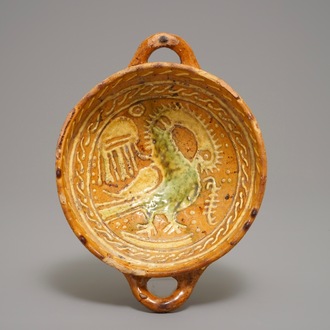 A Dutch slipware porringer with a mythical bird, Northern Netherlands, 1st half 17th C.