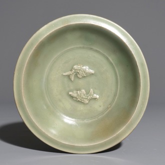 A Chinese Longquan celadon twin fish plate, Ming