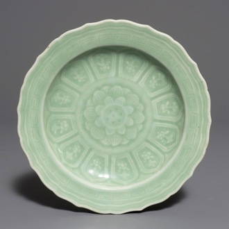 A Chinese celadon-glazed plate with underglaze lotus design, Qianlong