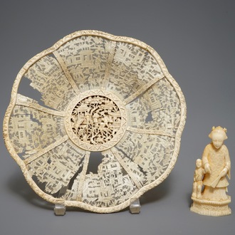 A Chinese pierced ivory basket and a small group of a lady with child, 19th C.