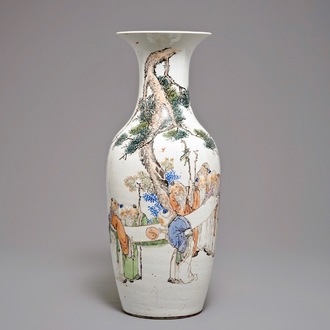 A large Chinese qianjiang cai vase with sages holding a scroll, 19/20th C.