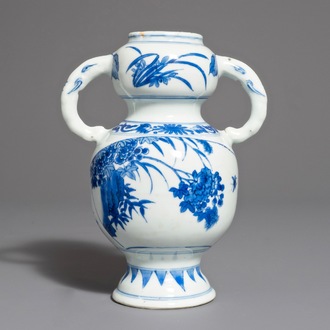 A Chinese blue and white elephant handle vase, Transitional period