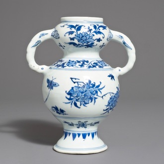 A Chinese blue and white elephant handle vase, Transitional period