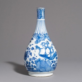 A fine Chinese blue and white bottle vase with a phoenix, hare mark, Wanli