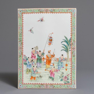 A Chinese famille rose plaque with playing boys, 1st half 20th C.