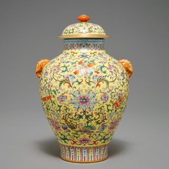 A Chinese famille rose yellow-ground vase and cover, Qianlong mark, 20th C.