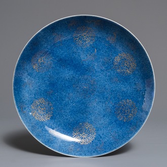 A Chinese powder blue and gilt lotus scroll dish, Kangxi
