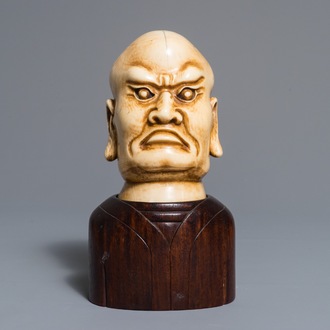 A Chinese carved ivory Luohan head on wooden bust, 1st half 20th C.