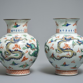 A pair of Chinese wucai dragon vases, Wanli mark, 19th C.