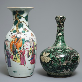 A Chinese famille noire garlic mouth vase and a famille rose vase with large figures, 19th C.