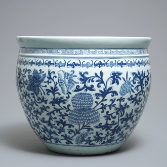 A Chinese blue and white fish bowl with bats and flowers, 19th C.