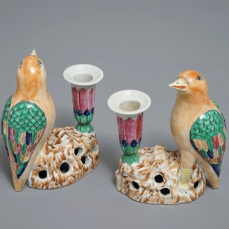 A pair of Chinese famille rose candle holders shaped as birds on a rock, Jiaqing