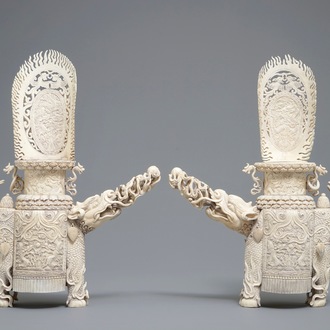 A pair of Chinese ivory models of fire spitting qilin, 19th C.