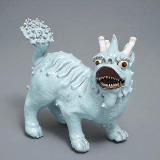 A Chinese Shiwan glazed pottery model of a qilin, 19/20th C.