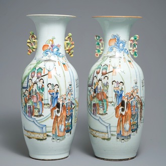 A pair of Chinese famille rose vases with figures on a terrace, 19/20th C.