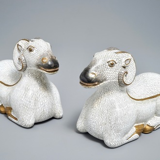 A pair of Chinese cloisonné and gilt bronze models of rams, Qianlong