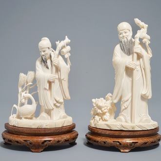 Two Chinese carved ivory figures of sages on wooden stands, 1st half 20th C.