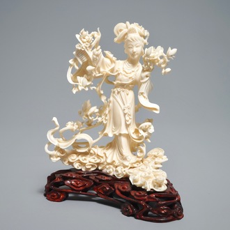 A Chinese carved ivory figure of Lan Cai He, 1st half 20th C.