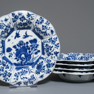 Five Chinese blue and white lobed plates with floral design, Kangxi