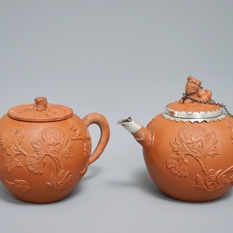 Two Chinese Yixing stoneware teapots with applied floral design, Kangxi