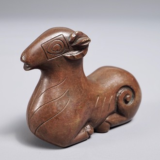 A Chinese bronze scroll or paper weight shaped as a ram, 17/18th C.