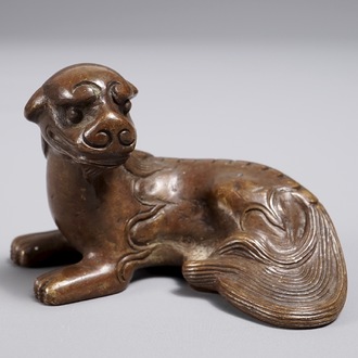 A Chinese bronze scroll or paper weight shaped as a qilin, 18/19th C.