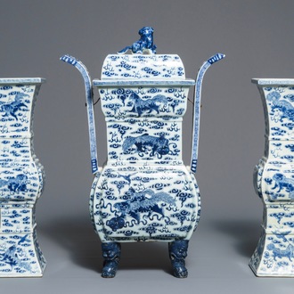 A Chinese blue and white 'Buddhist lions' altar set with incense burner, 19th C.