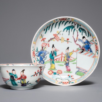 A Chinese famille rose 'Romance of the Western chamber' cup and saucer, Yongzheng/Qianlong