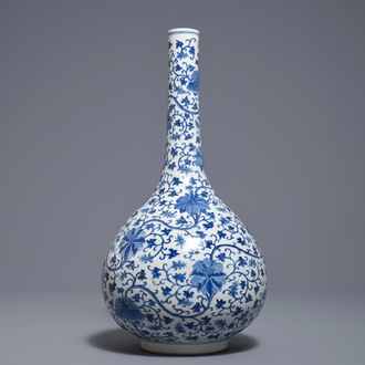 A Chinese blue and white 'lotus scroll' bottle vase, 18/19th C.