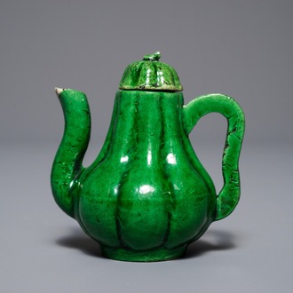 A small Chinese verte biscuit 'chrysanthemum' teapot and cover, Kangxi