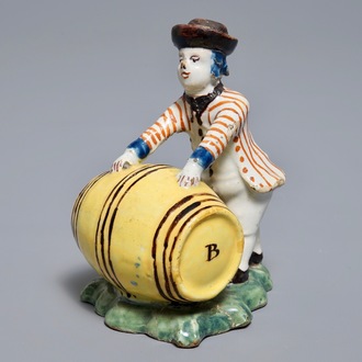 A polychrome Dutch Delft model of a wine merchant, 18th C.