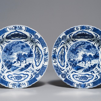 A pair of Chinese blue and white deep plates with qilins and phoenixes, 18/19th C.
