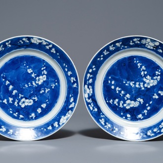 A pair of Chinese blue and white 'prunus' plates, Kangxi