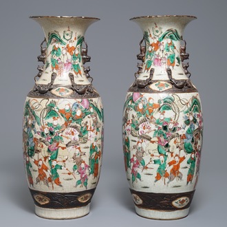 A pair of Chinese Nanking famille rose vases with warriors, 19th C.