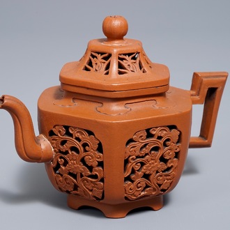 A Chinese reticulated double-walled Yixing stoneware teapot and cover, Kangxi