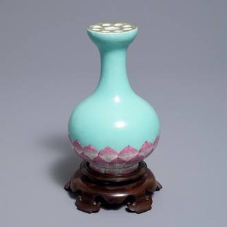 A Chinese famille rose turquoise ground lotus flower-shaped vase, 19/20th C.