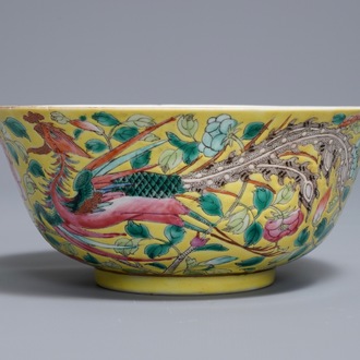 A Chinese famille rose on yellow ground 'phoenix' bowl, Qianlong mark, 19th C.