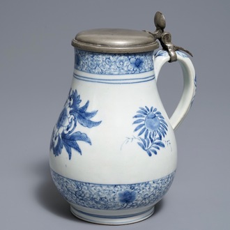 A Japanese blue and white pewter-mounted Arita jug, Edo, 17/18th C.