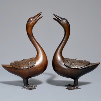 A pair of Chinese bronze duck-shaped incense burners and covers, 18th C.