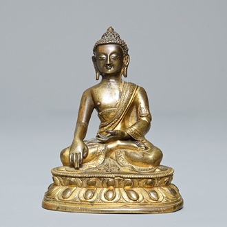 A Sino-Tibetan gilt bronze figure of Buddha Shakyamuni, 18th C.